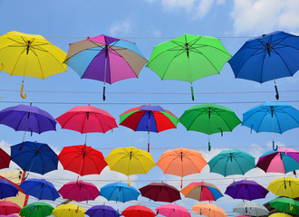 Colorful umbrellas background. Coloruful umbrellas urban street decoration.