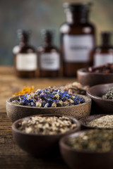 Herbal medicine on wooden desk background