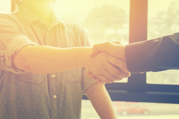 Teamwork concept,Successful business,Handshake,Business man holding hands .Business people joining hands together.People Teamwork holding Handshake.cooperation success business,selective focus,vintage
