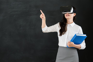asian woman teacher touch screen with VR headset