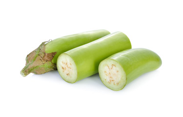 portion cut fresh green long eggplant on white background