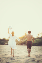 couple on beach,Freedom of the lifestyle joyful happiness love concept