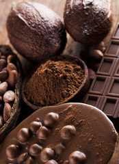 Chocolate sweet, cocoa pod and food dessert background