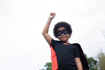 African American super hero child on launch stance - with copy space