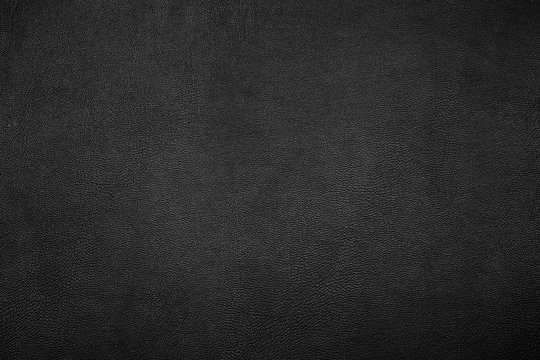 Black leather texture close up background.