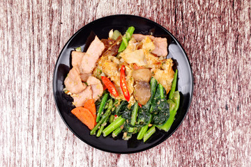 Fried big noodle topped mixed vegetables for organic food.