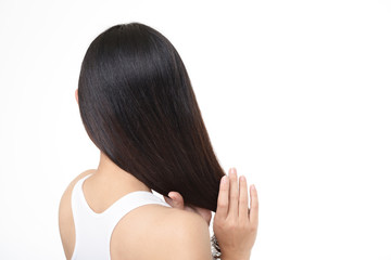 Obraz premium ヘアケアをする女性
