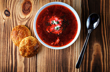 Borscht or soup on a wooden background