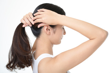 Fototapeta premium 髪を結う女性