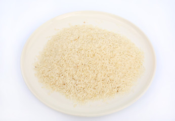 Jasmine white rice on white plate against white background