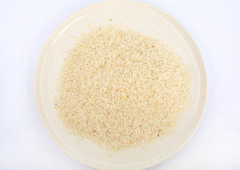 Jasmine white rice on white plate against white background