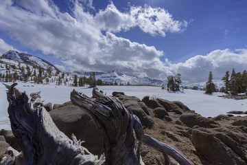 Carson Pass Snow - An alpine lake in the dead of winter in the Sierra Nevada on the pacific crest trail.