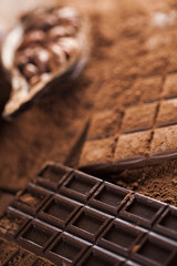 Chocolate bar, candy sweet, dessert food on wooden background