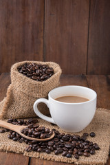 Coffee cup and coffee beans