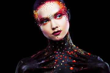 Young attractive girl in bright art-makeup, body painting.