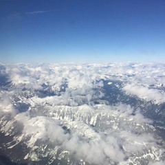 Fototapeta premium Aerial view of snow covered mountains