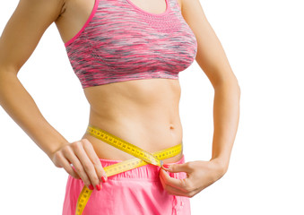 Woman making waist measurements