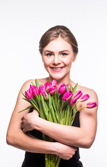 Portrait of beauty girl hugging tulips