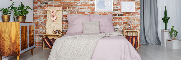 Bed in industrial bedroom