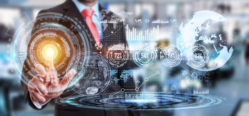 Businessman using hologram screen with digital data