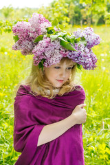 Girl in lilac garden