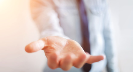 Businessman showing his empty hand