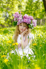 Girl in lilac garden