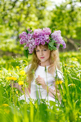 Girl in lilac garden