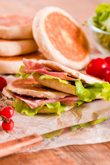 Tigella bread stuffed with ham and lettuce. 