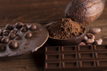 Chocolate bar, candy sweet, dessert food on wooden background