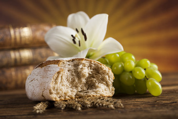 Symbol christianity religion a golden chalice with grapes and bread wafers