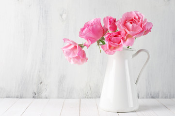 Pink roses in jug