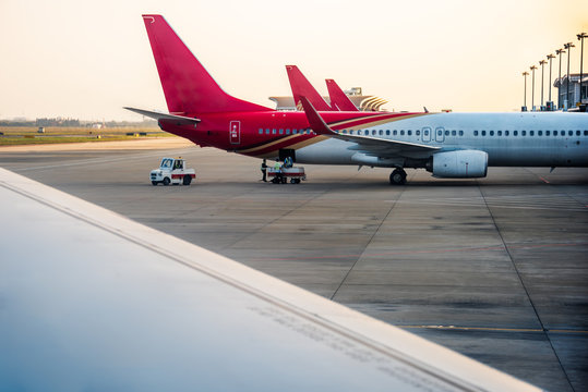 Planes On Runway In Modern Airport Of China.