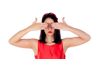 Elegant brunette girl with a red flower crown covering her eyes