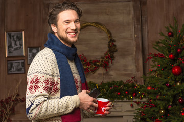 Smiling man waiting for christmas