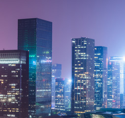 Fototapeta na wymiar illuminated cityscape at night in Shanghai,China.