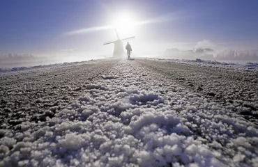 Foto auf Leinwand windmill in snow © anjokan