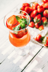 Cocktail with fresh strawberry and mint