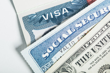 US Visa, Social Security Card and one dollar bill