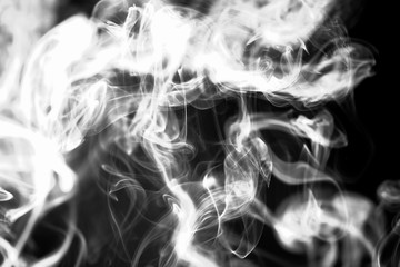 Abstract white smoke on a black background