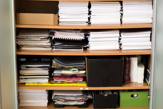 Bookshelf full of documents, papers, book &ndash; archive at home