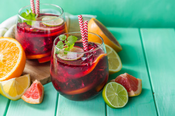 Sangria and ingredients in glasses