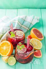 Sangria and ingredients in glasses