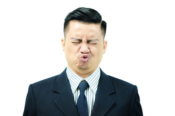 Asian men are exercising facial muscles, pucker up and eyes closed