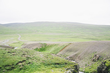 Fototapeta premium snowy hills in the south Iceland