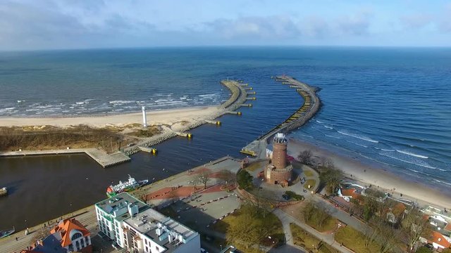 Lighthouse on the baltic seashore in a small resort town of Kolobrzeg in Poland