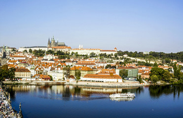 Fototapeta na wymiar Prague, city panoram, Carls Bridge, river Moldova, hill Hradschi