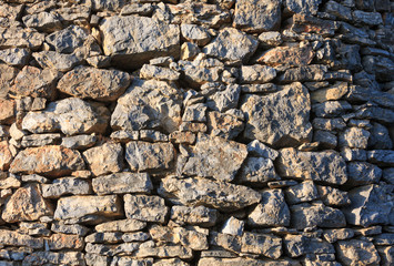 Old stone wall (background).
