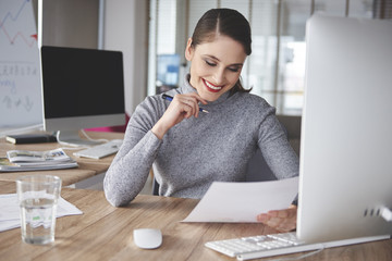 Hard working woman in office building
