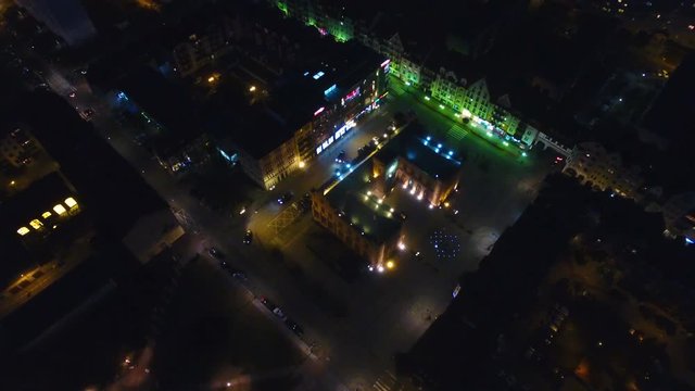 Aerial night view of the City Hall in an old town of Kolobrzeg in Poland